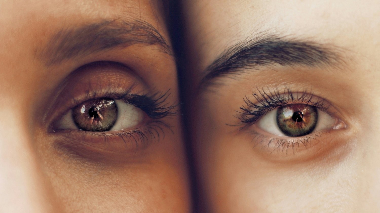 Close-up photograph of two people’s eyes